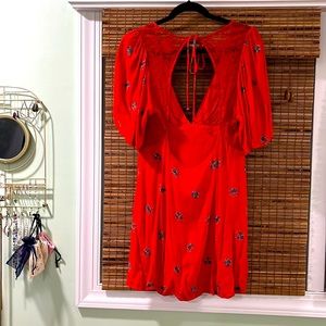 Free people orange bell sleeve floral mini dress